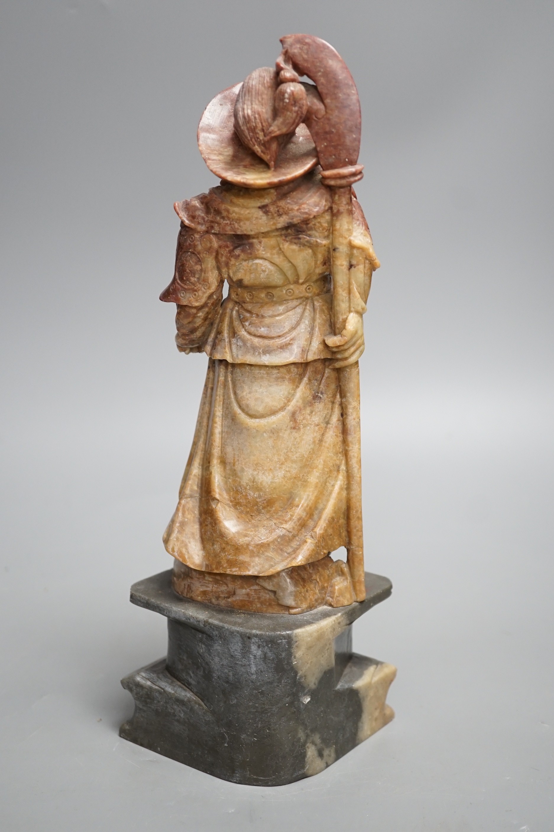 An early 20th century Chinese soapstone carving of Zhong Kui, 30cm high.